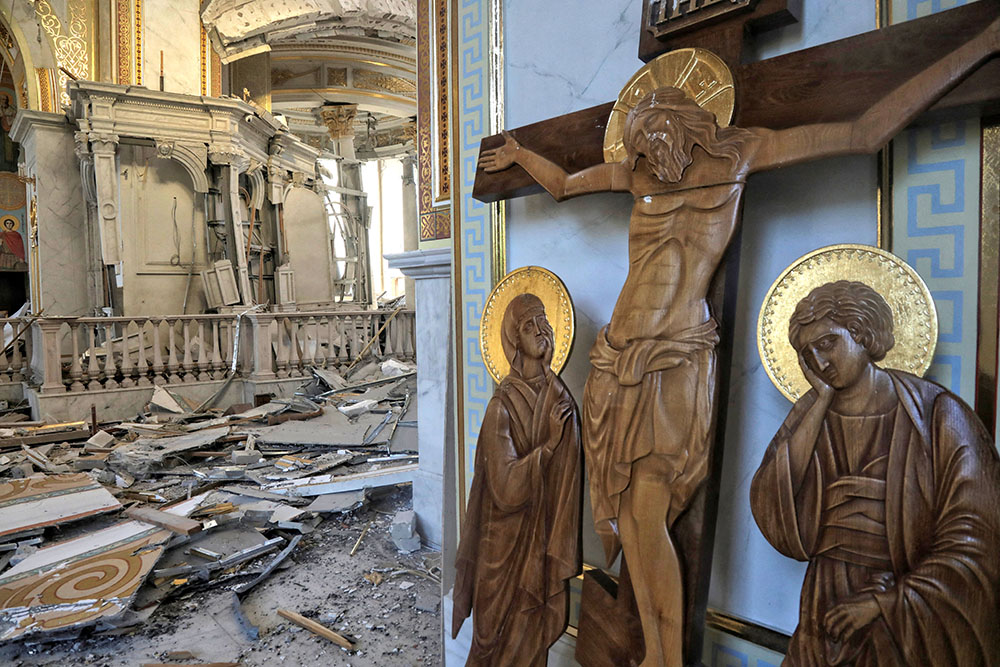 A crucifix is seen inside Transfiguration Cathedral, which was damaged during a Russian missile strike in Odesa, Ukraine, July 23. (OSV News/Reuters/Nina Liashonok)